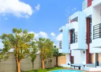 Shrubbery Palms Resort - piscina