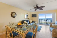 Spacious Kitchen and Leather Sofa - Charming Coastal Suite