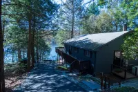 Stylish Lakefront Retreat with Sauna and Dock - Tranquil Escape Hotels near Top Golf Swing Suite at The Alder