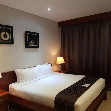 Paddy's Hotel & Apartments Отели рядом с достопримечательностью «Заповедник Порт-Морсби»