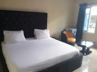 Santrick Hotel Hotels near CCC El-Morijah Olubukun Parish Igbogbo