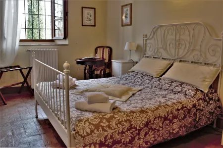 Relais CastelBigozzi Отели рядом с достопримечательностью «Chiesa di Santa Maria Assunta»