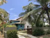 House with swimming pool, 5 bedrooms (4 suites) 40 meters from the beach. Hotels in Guarajuba