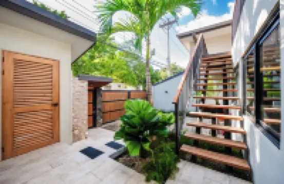 Iguana Surf Villas,  6 bedrooms, 6.5 bathrooms,  5 kitchens center of Tamarindo