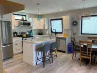 New 2 bedroom carriage house, a block from the Okanogan lake, close to downtown.