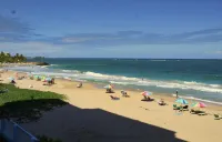 The BEACH PAD- A Beachfront,  Full Ocean View Apartment