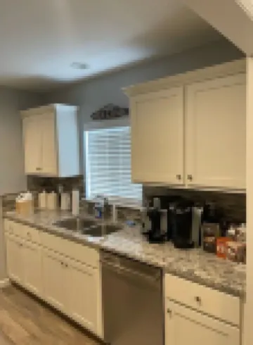 Perfect Oasis. NEW Home Away from Home with COVERED PARKING-Close to everything