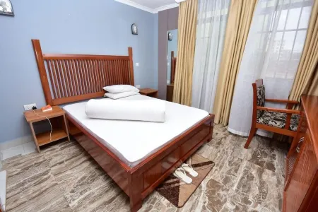 Acres Hotels Отели в г. Аруша