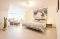 Robbenglück Tossens OG - 2 bedrooms, garden terrace, dog allowed