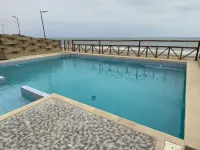 Beach house with 4 bedrooms for 12, Wi-Fi, and AC Hotels in 