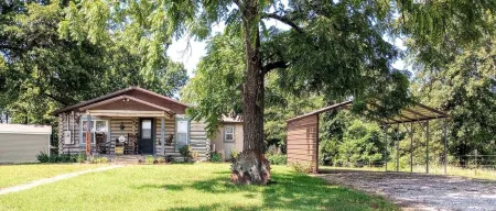 Beula 1869 cabin in "The Land"