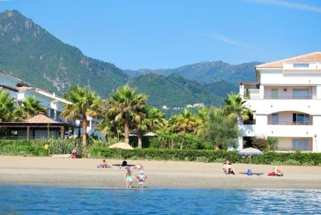 Apartment in residence with swimming pool and private beach