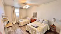 Majestic bayfront home. 450’ pier w/ boat access, crabbing, fishing, & swimming.