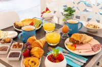 Kyriad Saint Etienne Centre - breakfast