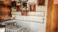 Treebo Winsome Resort with Swimming Pool - bar