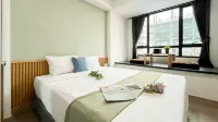 Ivory Studio at Collins Boulevard Apartment By Travelio