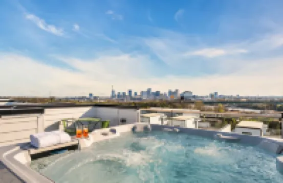Luxury Stay With Rooftop Views in Prime Location
