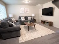 Spacious fully loaded 4-bedroom townhome sleeps 12 freeway access next to BYU Hotels in Springville