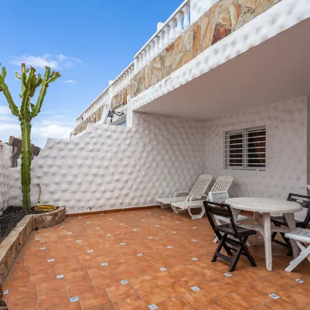 Apartment Near the Beach with a Huge Terrace Patio, Wifi and Parking