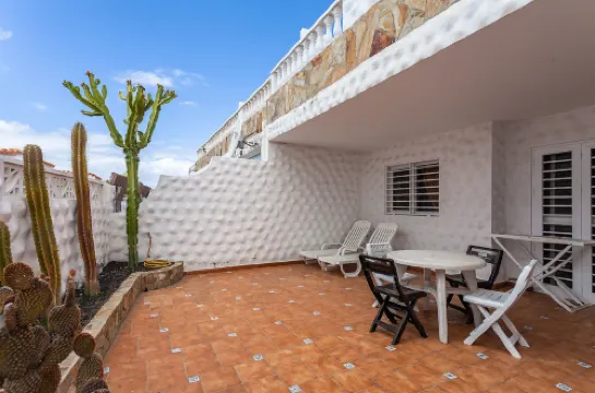 Apartment Near the Beach with a Huge Terrace Patio, Wifi and Parking