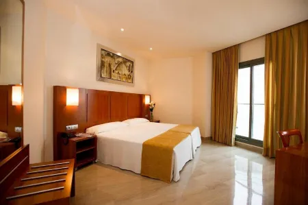 Leflet Valme Отели в г. Дос-Эрманас