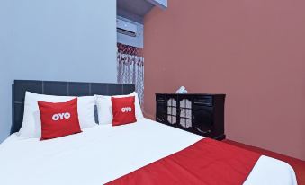 OYO 90664 Rabi Hotel