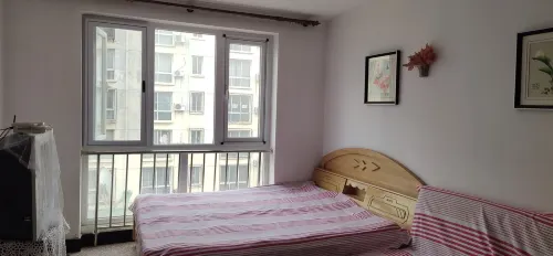 Facing the Sea, Spring Blossoms Nier Apartment (Xinkai Road)