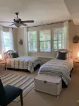 Nestled by the 7th green, large deck areas. Movie theatre for inside or out.
