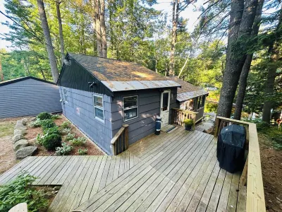 Professionally styled waterfront cottage on Sebago.  Cozy and Serene.