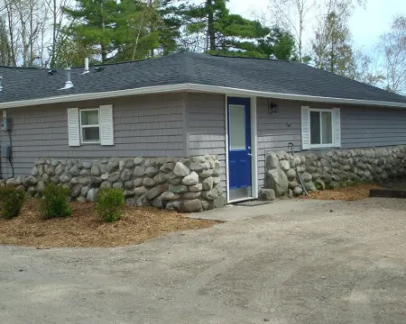 Hot Tub! Outside Traverse City, Sleeps 6 Pet Friendly, Fire Place, Fire Pit Hotels in Interlochen