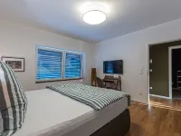 85qm Garten Suite mit 2 Schlafzimmern / Terrasse und Garten Hoteles en Willich