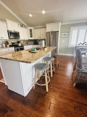 Private Home with Heated Pool. Steps to Beach.