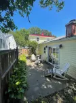 Charming 4-bedroom, 2-bath cottage, dog friendly, AC, WiFi, 1 block to beach