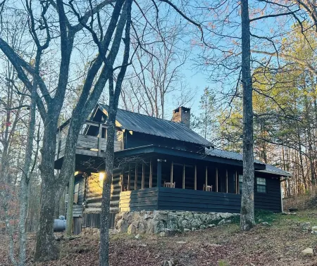 Fully restored cabin, 150 years old, nestled on Lookout Creek Farms