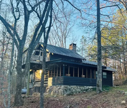 Fully restored cabin, 150 years old, nestled on Lookout Creek Farms