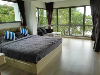 Beachfront accommodation in Sriracha with a private beach