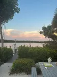 Beautiful waterfront condo with a boat dock, pool, and across from the beach