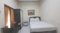 OYO 93402 Family Homestay Syariah Hotels near House of Representatives Building of Binjai City