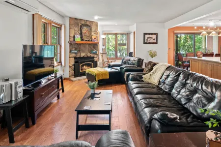 Lakeside Retreat with Balcony and Patio - Charming Modern Oasis