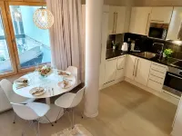 Superb 1Br Home with Sauna and Terrace Hotels in 
