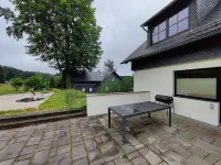 Spacious Semi Detached House with Wood Stove Located Directly on the Rennsteig Hotels in Sachsenbrunn