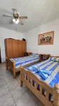 Tirent Apartment - Cozy Bedrooms Stay by Golem Beach.