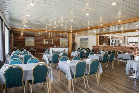 Hotel Lynggaarden Отели в г. Хернинг