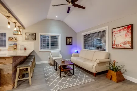 Spacious Living with Gourmet Kitchen and Smart TVs - Modern Retreat