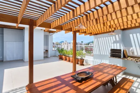 Edífico Residencial Unique Отели рядом с достопримечательностью «Ubatuba Bus Station»