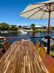 Luxury Waterfront Retreat: Pet friendly Canal Home with Jetty on Bribie Island! Hotels in Bongaree