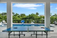 Sophisticated 5-bedroom, elevator, 50' dock, heated pool/spa, sleep 12