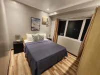 New! Stylish 2 BR in BGC - Fast Wi-fi 58" UHD TV