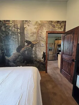 Themed Bear's Den Cabin__nestled in the pines minutes outside of Glacier Park.