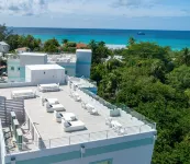 7 Mile Beach Private Beach Club. Ocean views from Roof Terrace and Pool Pavilion